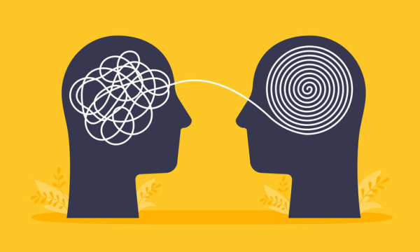 Two black heads outlined against a yellow background; one showing white loops of tangles and the other showing neat white coils to indicate upsetting thoughts and calmer thoughts 